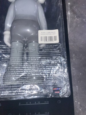 three fine art toys kaws medicom companion open edition nine new brown, grey, black moma 11